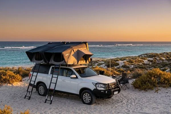 Rooftop tent setup at Ningaloo Reef