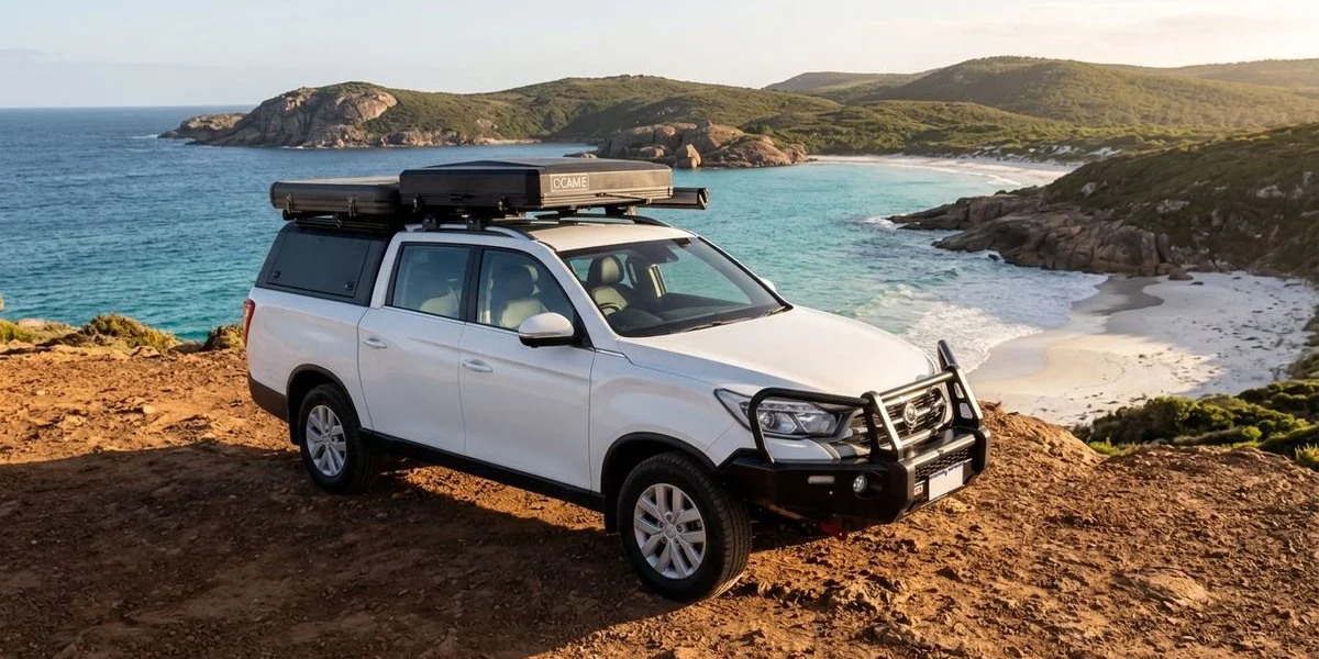 Bakkie 2.0 parked at a scenic WA lookout with turquoise ocean in the background